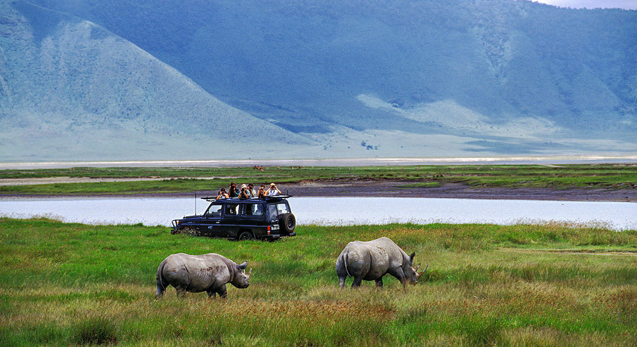 1-slide-serengeti-safari-masai-hippopotamus-pano